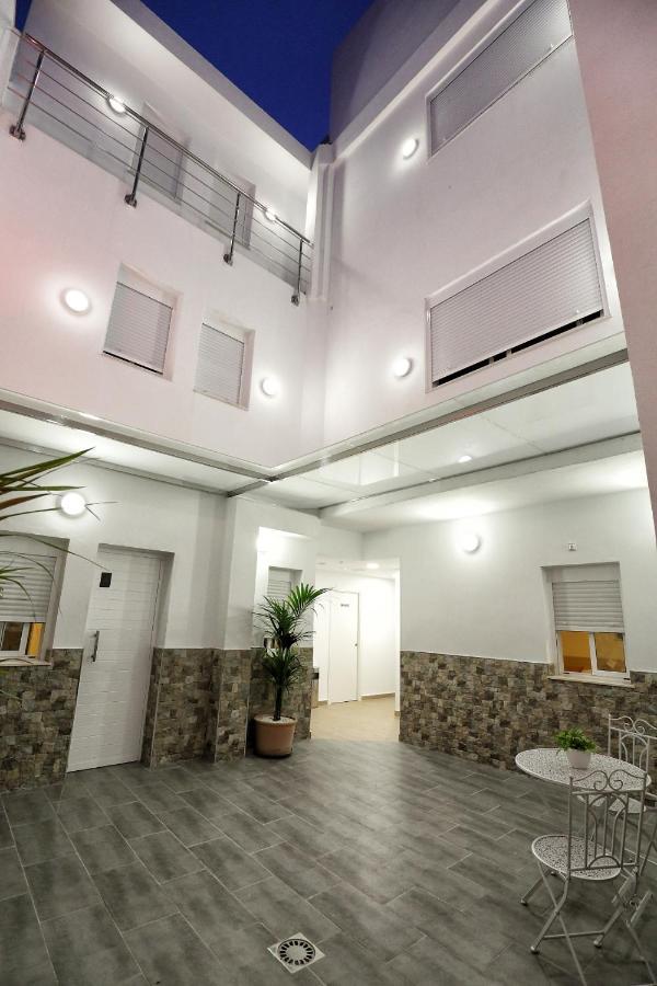 H.Palmones Hostel Bagian luar foto